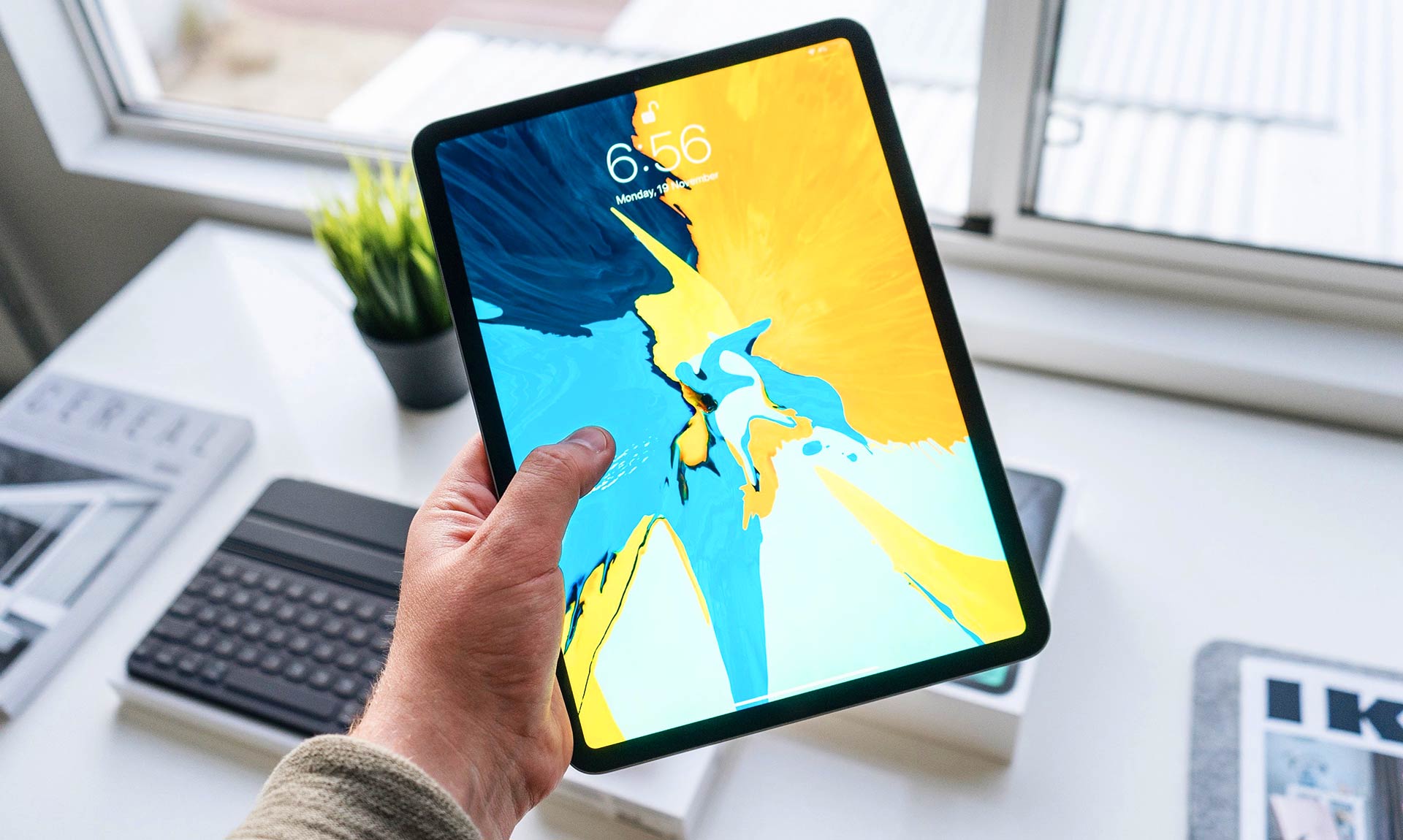Person Holding Tablet Person Holding Tablet